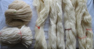 six different samples of handspun wool yarns.
